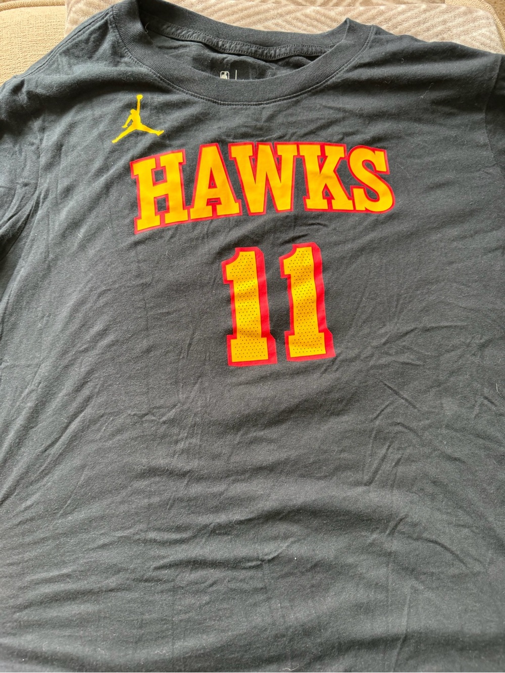 Nike Black Graphic Tee with Yellow & Red Hawks Print